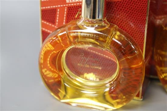 A boxed bottle of No.4711 eau de cologne and two boxed Hermes perfumes